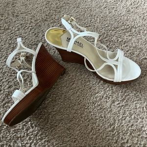 White Michael Kors wedges size 8.